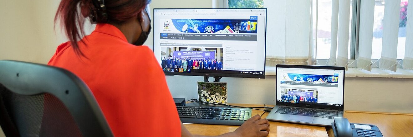 Young woman on desktop office setting